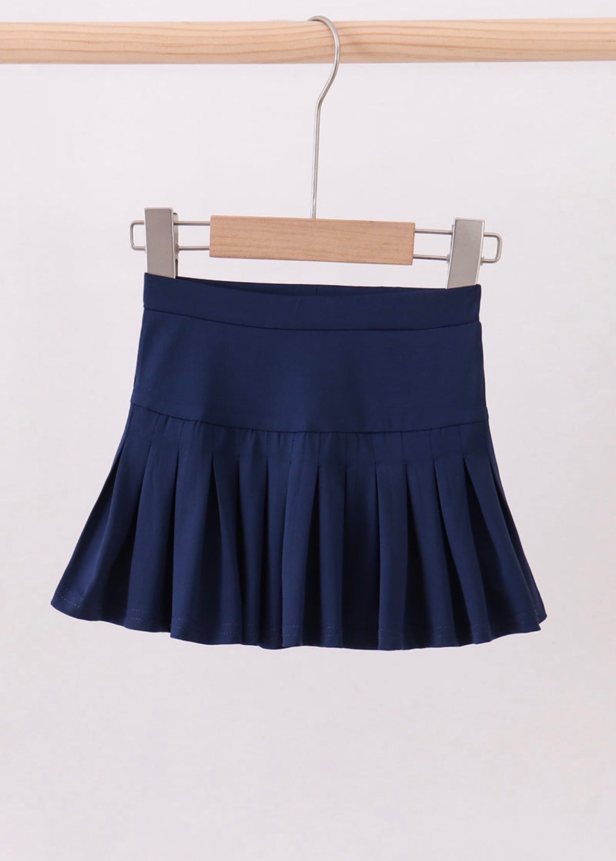 Navy pleated skort outfit