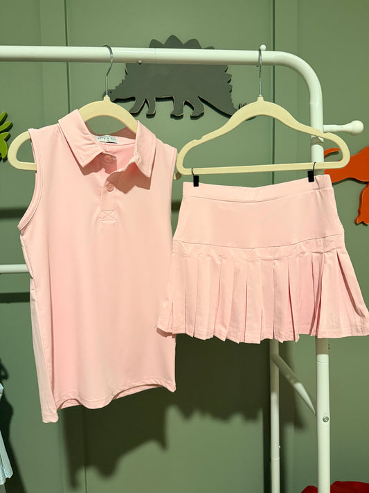 Pink pleated skort outfit