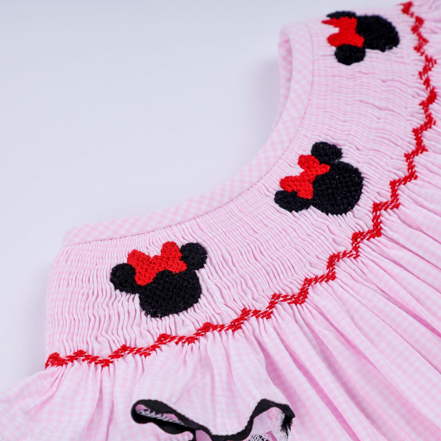 Red character hand smocked plaid ruffle bubble