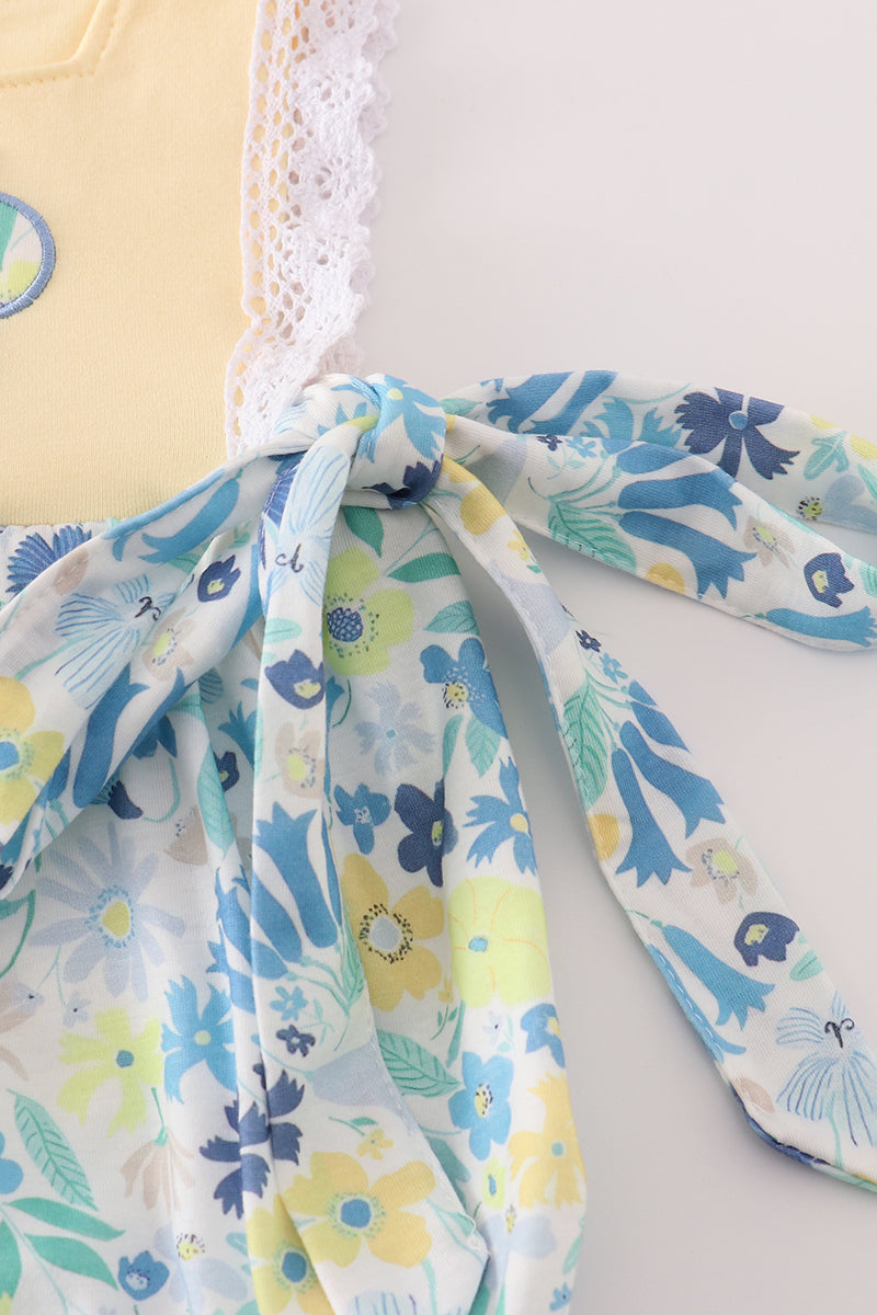 Yellow floral character applique bubble